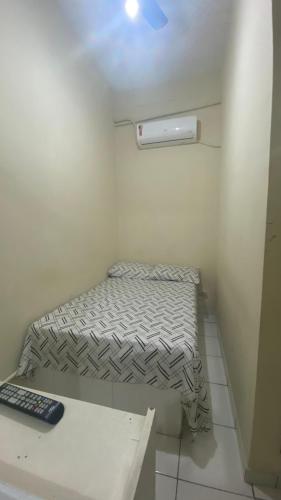 Postel nebo postele na pokoji v ubytování Pousada e Alojamento Engenho de Itaguaí