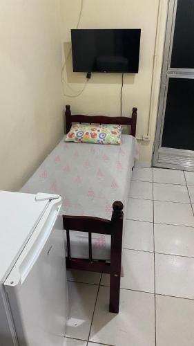 TV a/nebo společenská místnost v ubytování Pousada e Alojamento Engenho de Itaguaí