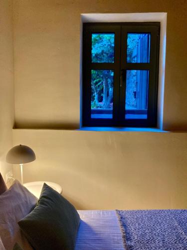 Ένα ή περισσότερα κρεβάτια σε δωμάτιο στο Koilada Holiday Home