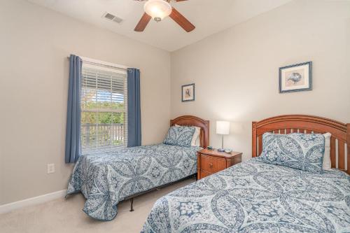 Ένα ή περισσότερα κρεβάτια σε δωμάτιο στο River Crossing #1134