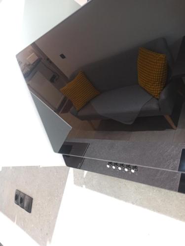 a view of a living room with a couch at Sodi Cozy apartment in Kardítsa