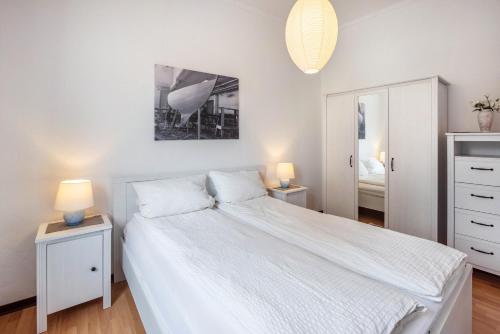 Postel nebo postele na pokoji v ubytování Ferienwohnung an der Ostsee