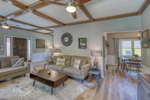 a living room with a couch and a table at Outlaw Homestead in Deadwood