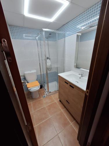a bathroom with a shower and a sink and a toilet at Laurent's house - ATTC International Vacations in Isla del Fraile