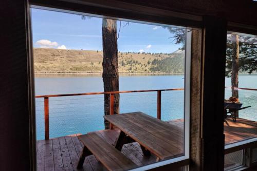 a view of a lake from the porch of a cabin at Lakefront on Lake Shore in Joseph