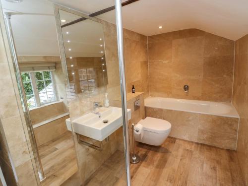 Et badeværelse på Woodman's Cottage