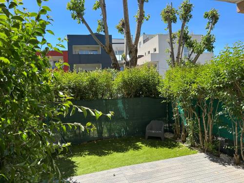 Appartement cosy avec jardin, jacuzzi et tram à 2 min - Quartier calme