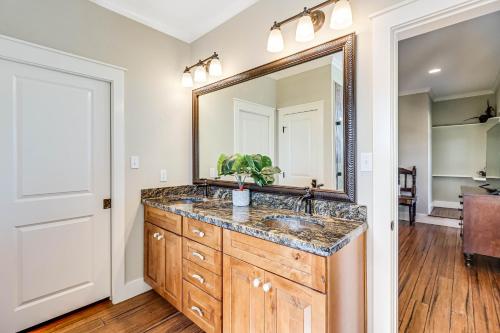 a bathroom with a sink and a mirror at The James Pearl in Rockport