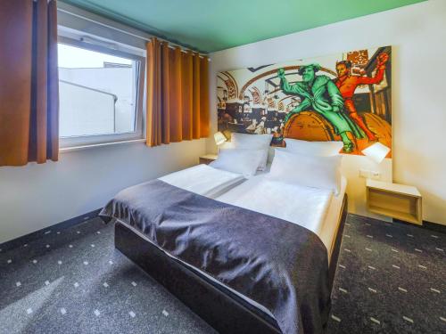 Postel nebo postele na pokoji v ubytování B&B Hotel Leipzig-City
