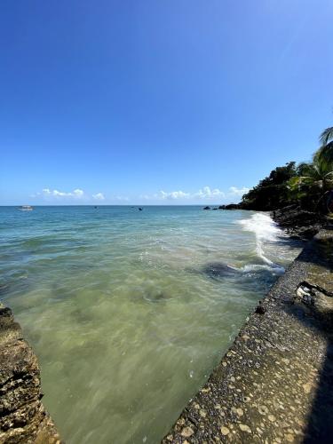 a view of the ocean from a rocky beach at Pal Mar our beach house 