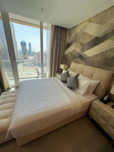 Cozy Stay tesisinde bir odada yatak veya yataklar