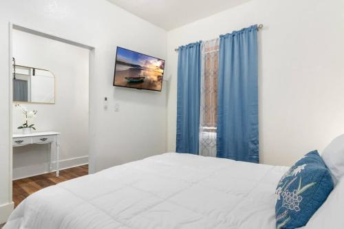 Ένα ή περισσότερα κρεβάτια σε δωμάτιο στο Charming 2-Bedroom Home Lakeland