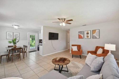 a living room with a couch and a table at Comfortable Home in Dade City! in Dade City