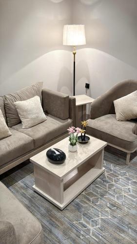 Χώρος καθιστικού στο الإقامة الذهبية للشقق المخدومة Golden Residence Hotel