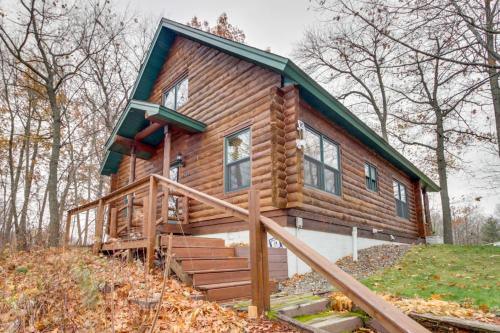 a log cabin with a green roof at Pet-Friendly Garrison Retreat in Garrison