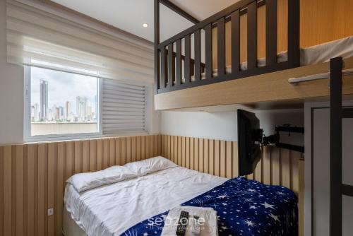 a bedroom with a bunk bed and a staircase at Apto 2Q c/ churrasq. prox da praia - BC - STL401 in Balneário Camboriú