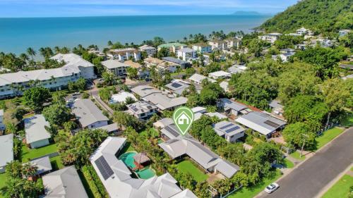 an aerial view of a residential neighborhood with houses at Poolside Palms Villa in Trinity Beach
