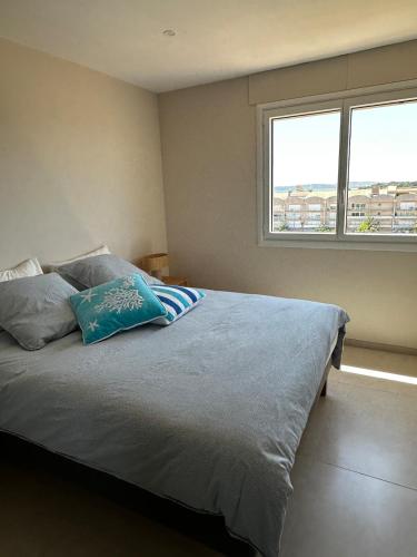 Postel nebo postele na pokoji v ubytování Bleu Horizon, appartement vue mer