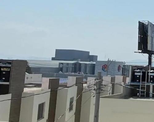 a view of the roofs of a building at Moderno Departamento Ejecutivo frente a Explanada in Pachuca de Soto