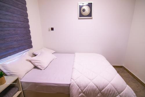 Φωτογραφία από το άλμπουμ του Cozy Luxury - East Legon Apt - WiFi, Netflix & AC σε Accra