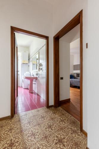 an open door into a living room with a bedroom at Agriturismo Borgo dei Ricci in Impruneta