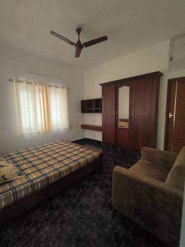 Postel nebo postele na pokoji v ubytování Palm Villa