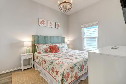 a small bedroom with a bed and a window at Turtle Cove in Rockport