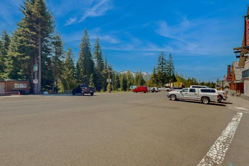 a parking lot with a white truck parked on the street at Cozy Cabin in Government Camp in Government Camp