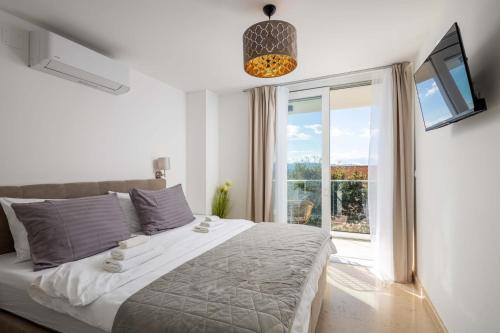 Postel nebo postele na pokoji v ubytování Villa Aurelia