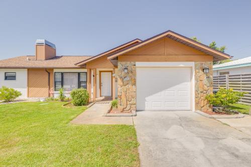 a house with a garage in the yard at King size bed, private bathroom, flat TV in Clearwater