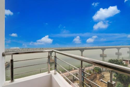 a view of a bridge over the river at Super Hotel O Kadam Ghat Near Ashok RajPath in Patna
