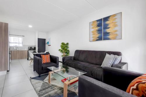 Ruang duduk di Lovely 2 bedroom, bathroom