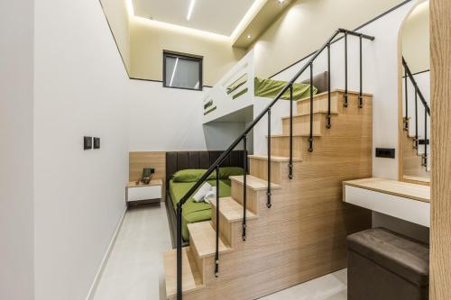 a room with bunk beds on the second floor at Emily Jacuzzi Veranda by PS in Durrës