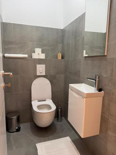 Un baño de Apartman Centar