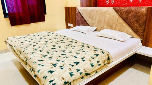 Postel nebo postele na pokoji v ubytování Hotel Tanish