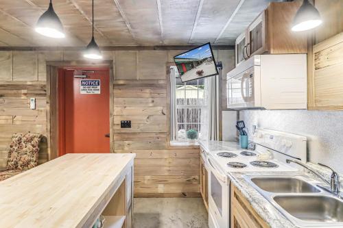 a kitchen with a sink and a stove at Casas Coastal Experience Cabin C in Rockport
