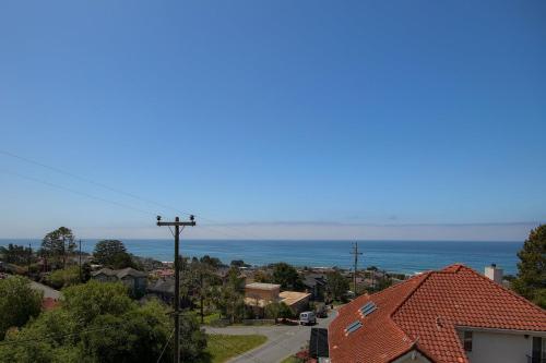a view of a town with the ocean in the background at Dream Catcher in Cambria