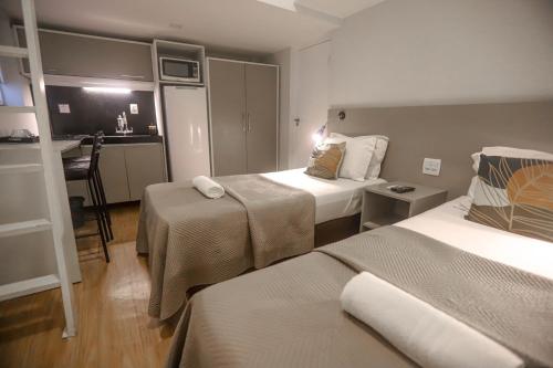 Katil atau katil-katil dalam bilik di Injoy Lofts & Studios Ipanema