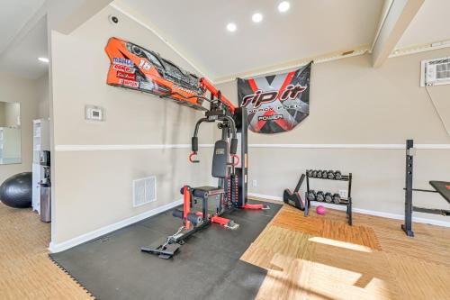 a room with a gym with skis on the wall at Lake-View Home with Pool Access in Sherrills Ford! in Sherrills Ford