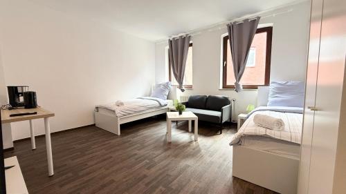 Postel nebo postele na pokoji v ubytování Apartments für Firmen & Monteure Zentral in Kiel