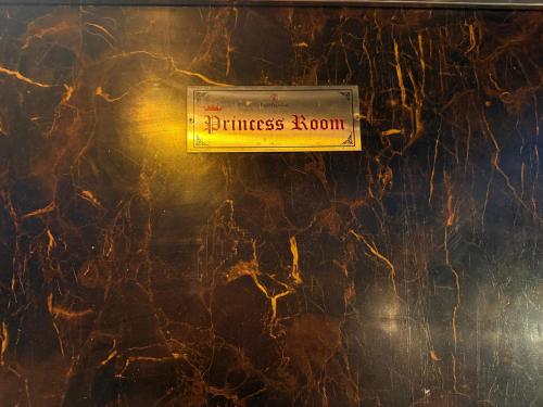 a sign that reads business room on a marble wall at Popli Paradise Resort in Jaipur