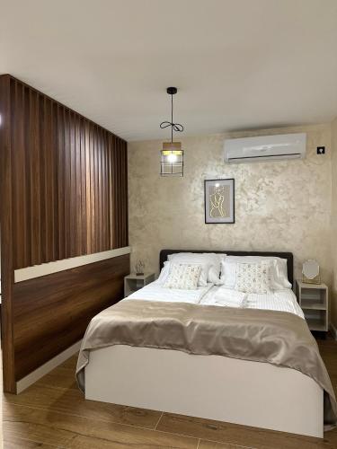 Postel nebo postele na pokoji v ubytování Villa Sunset Mostar
