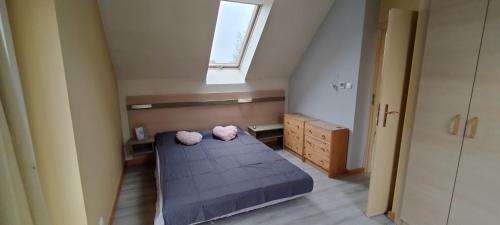 Voodi või voodid majutusasutuse Sea House in Puck Free Parking toas