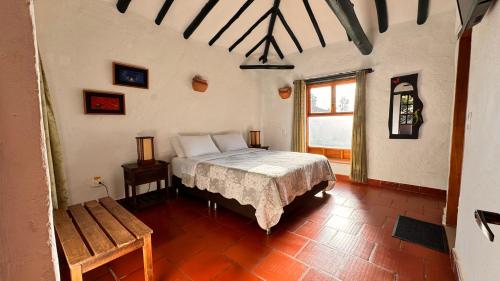 Postel nebo postele na pokoji v ubytování Posada Campestre La Casona