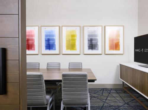 a conference room with a table and chairs at Staybridge Suites Kincardine Southeast in Kincardine
