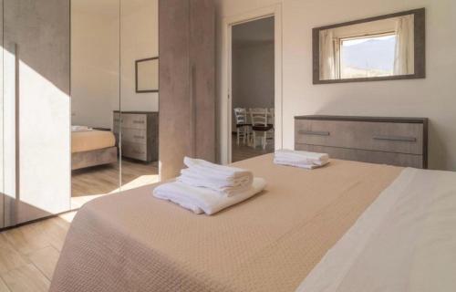 Katil atau katil-katil dalam bilik di Villa a due passi dal mare