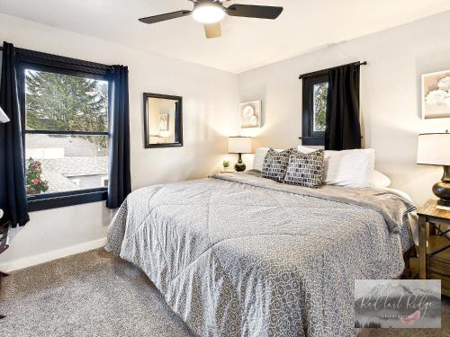a bedroom with a bed and a window at Boho Revival Modern Glam with AC in Downtown Albany in Albany