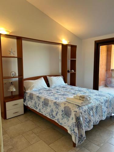 Cama o camas de una habitación en Casa Camilla