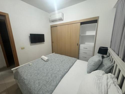 Postel nebo postele na pokoji v ubytování Boca del Mar