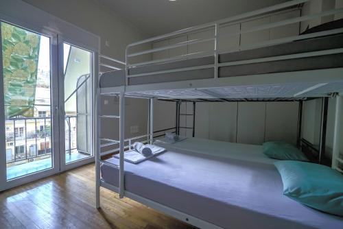 Postel nebo postele na pokoji v ubytování Economy shared apartment in central Athens